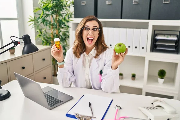 Young Woman Working Dietitian Clinic Celebrating Crazy Amazed Success Open — Stock Photo, Image