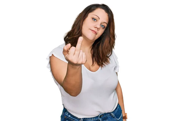 Young Size Woman Wearing Casual White Shirt Showing Middle Finger — Zdjęcie stockowe