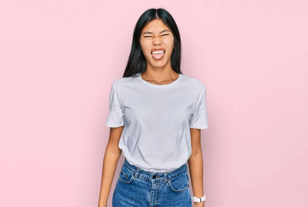 Beautiful Young Asian Woman Wearing Casual White Shirt Sticking Tongue — Stock Photo, Image
