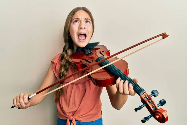 Beautiful Brunette Little Girl Playing Violin Angry Mad Screaming Frustrated — Stock Photo, Image