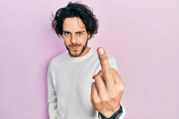 Handsome Hispanic Man Wearing Casual White Sweater Showing Middle Finger — ストック写真