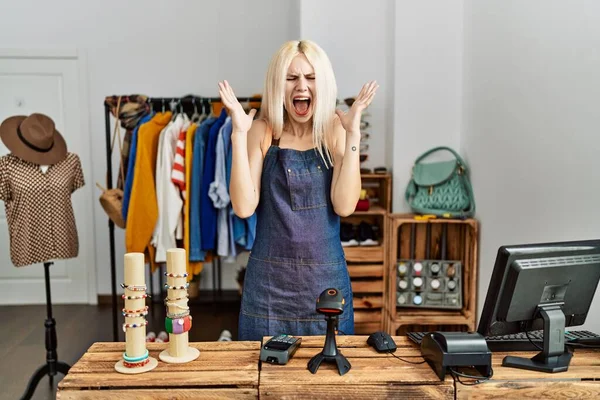 Beautiful Caucasian Woman Working Manager Retail Boutique Celebrating Mad Crazy — Stock Photo, Image