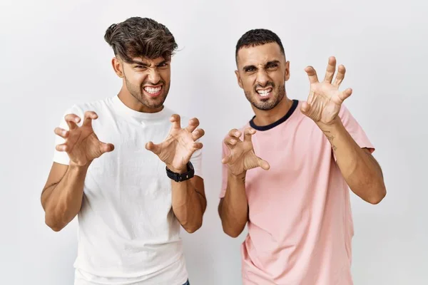 Young Gay Couple Standing Isolated Background Smiling Funny Doing Claw — Stock Photo, Image