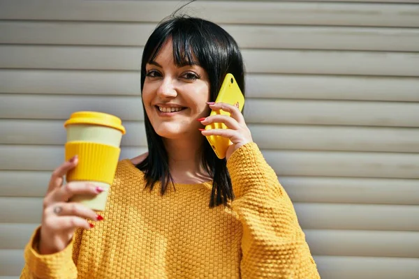 Young Brunette Woman Speaking Phone Drinking Cup Coffee Shutter Door — Stock Photo, Image