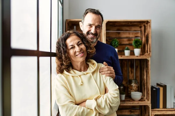 Middle Age Hispanic Couple Smiling Happy Leaning Window Home — Stock Photo, Image