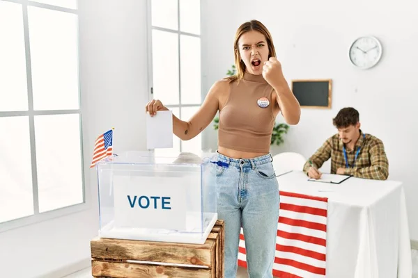 Young Blonde Girl Voting Putting Envelop Ballot Box Annoyed Frustrated — Stock Photo, Image