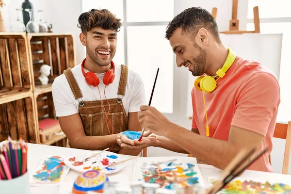 Two Hispanic Men Couple Smiling Confident Painting Palm Hands Art — Stock Photo, Image