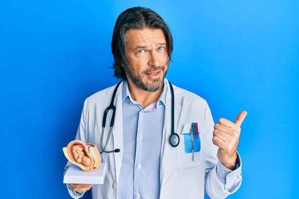 Middle Age Handsome Gynecologist Man Holding Anatomical Model Female Uterus — Stock Photo, Image