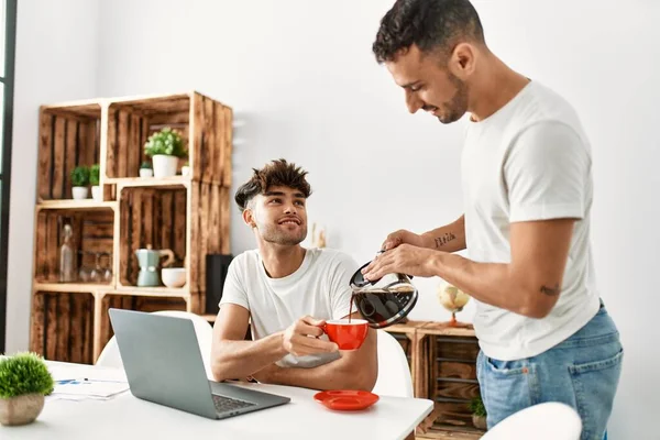 Two Hispanic Men Couple Pouring Coffee Having Breakfast Home — Stock Photo, Image