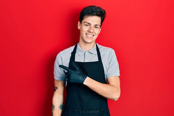 Young Hispanic Man Wearing Apron Cheerful Smile Face Pointing Hand — Stock Photo, Image