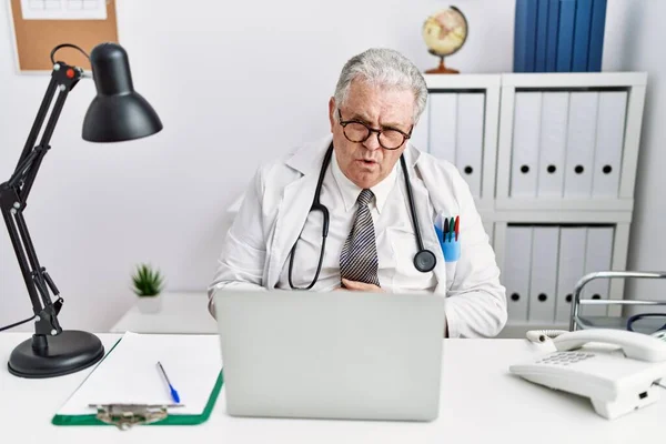 Senior Caucasian Man Wearing Doctor Uniform Stethoscope Clinic Hand Stomach — Stock Photo, Image