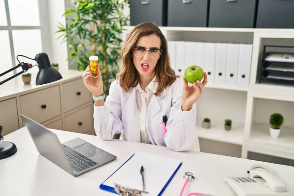 Young Woman Working Dietitian Clinic Clueless Confused Expression Doubt Concept — Stock Photo, Image
