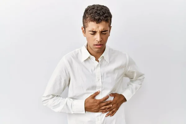 Homem Hispânico Bonito Jovem Sobre Fundo Isolado Com Mão Estômago — Fotografia de Stock