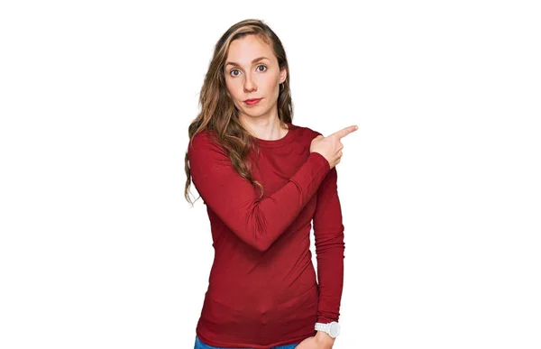 Young Blonde Woman Wearing Casual Clothes Pointing Hand Finger Side — Stock Photo, Image