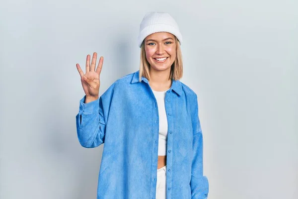 Beautiful Blonde Woman Wearing Wool Hat Showing Pointing Fingers Number — Stockfoto
