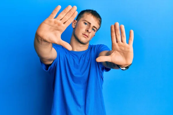 Young Caucasian Man Wearing Casual Blue Shirt Doing Frame Using — Stock Photo, Image