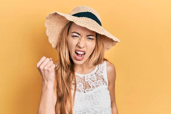 Young Caucasian Woman Wearing Summer Hat Angry Mad Raising Fist — 스톡 사진