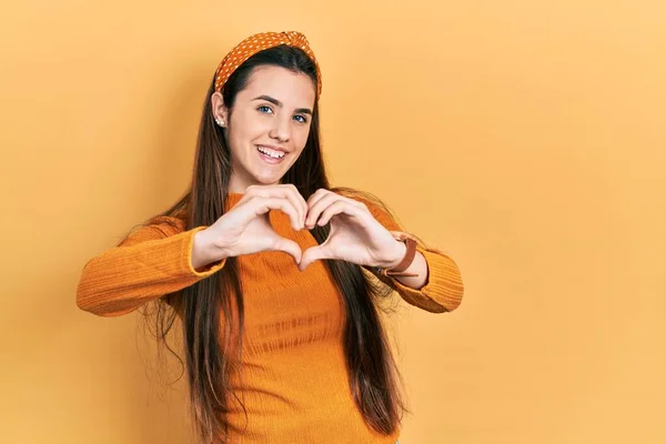 Young Brunette Teenager Wearing Casual Yellow Sweater Smiling Love Doing — Stock Photo, Image