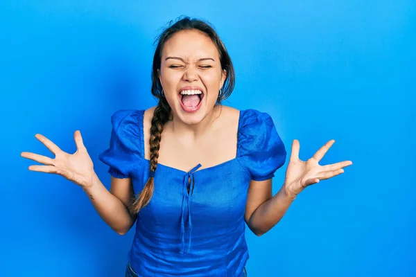 Young Hispanic Girl Wearing Casual Clothes Celebrating Mad Crazy Success — Stock Photo, Image