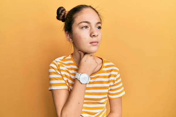 Beautiful Brunette Little Girl Wearing Casual Striped Shirt Touching Painful — Stock Photo, Image