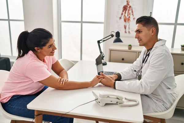 Man Woman Doctor Patient Having Medical Consultation Hands Together Clinic — Stockfoto