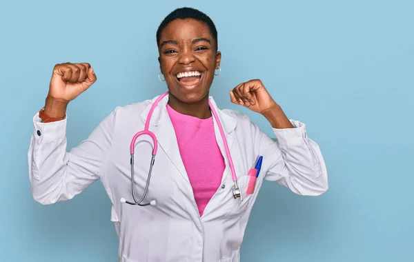 Young African American Woman Wearing Doctor Uniform Stethoscope Celebrating Surprised — Stock Photo, Image