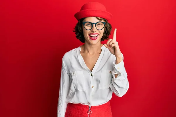 Young Brunette Woman Wearing Stewardess Style Glasses Pointing Finger Successful — Stock Photo, Image