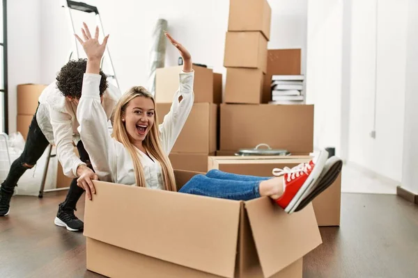 Young Beautiful Couple Smiling Happy Playing Using Cardboard Box Car — Stock Photo, Image