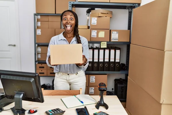 African Woman Working Small Business Ecommerce Holding Box Celebrating Crazy — Stock Photo, Image