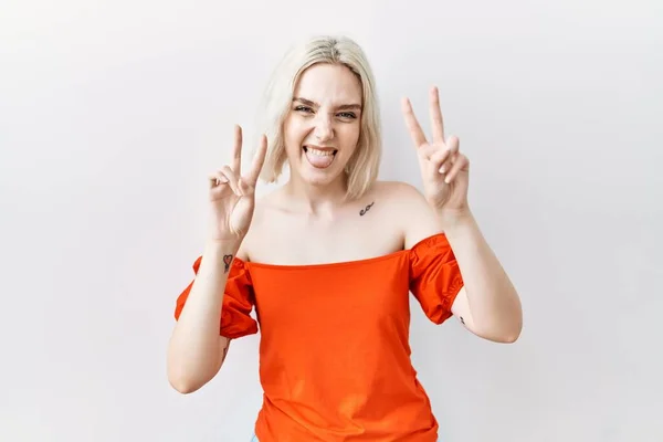 Young Caucasian Woman Standing Isolated Background Smiling Tongue Out Showing — Stock Photo, Image