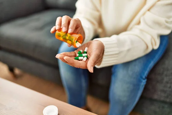 Middle Age Hispanic Woman Taking Pills Home — Stock Photo, Image