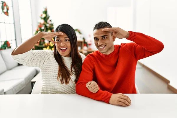 Young Latin Couple Sitting Table Christmas Tree Very Happy Smiling — Stockfoto