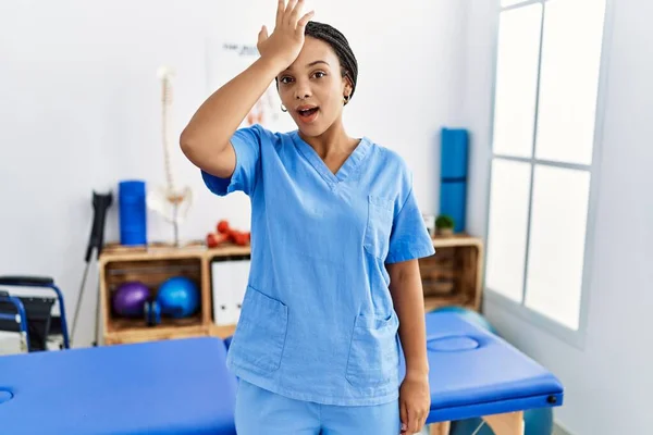 Young African American Woman Working Pain Recovery Clinic Surprised Hand — 스톡 사진