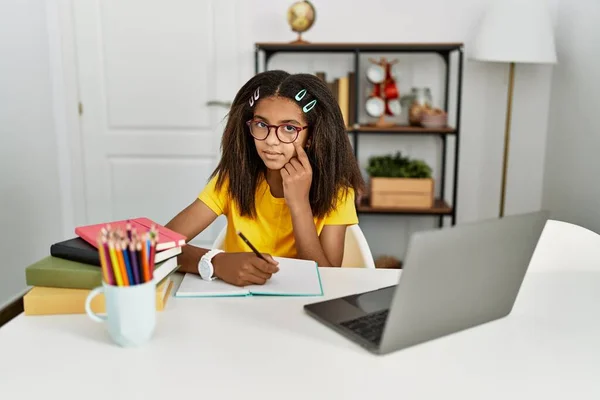 Young African American Girl Doing Homework Home Pointing Eye Watching — Stock Photo, Image