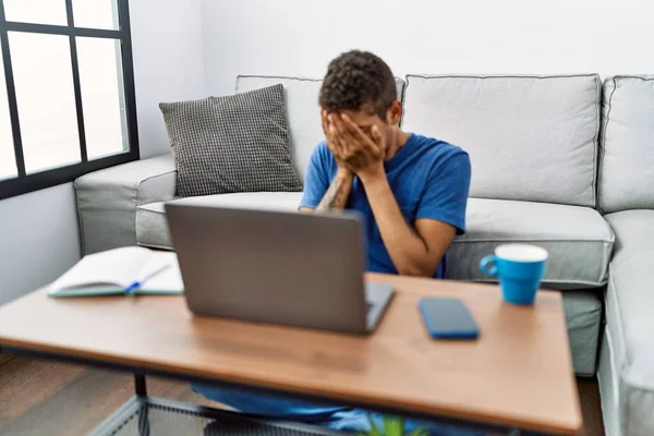 Young Handsome Hispanic Man Using Laptop Sitting Floor Sad Expression — Stock Photo, Image