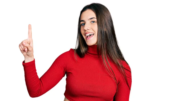 Młoda Brunetka Nastolatka Czerwonym Swetrze Wskazującym Palcem Udany Pomysł Wyszedł — Zdjęcie stockowe