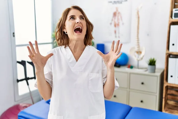 Middle Age Physiotherapist Woman Working Pain Recovery Clinic Crazy Mad — 图库照片