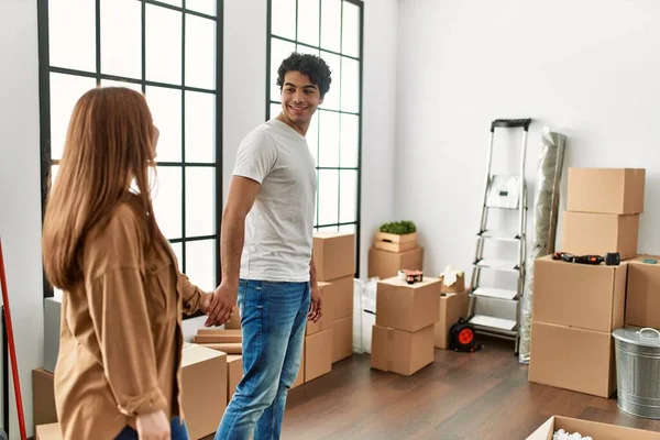 Young Couple Smiling Happy Walking Hands Together New Home — Stock Photo, Image