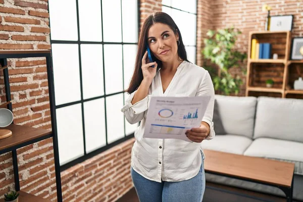 Young Hispanic Woman Speaking Phone Bills Smiling Looking Side Staring — Stock Photo, Image