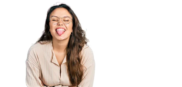Young Hispanic Girl Wearing Casual Clothes Glasses Sticking Tongue Out — Stock Photo, Image