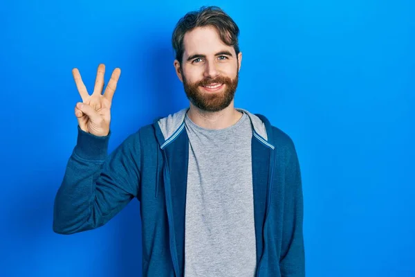 Caucasian Man Beard Wearing Casual Sweatshirt Showing Pointing Fingers Number — Stock Photo, Image