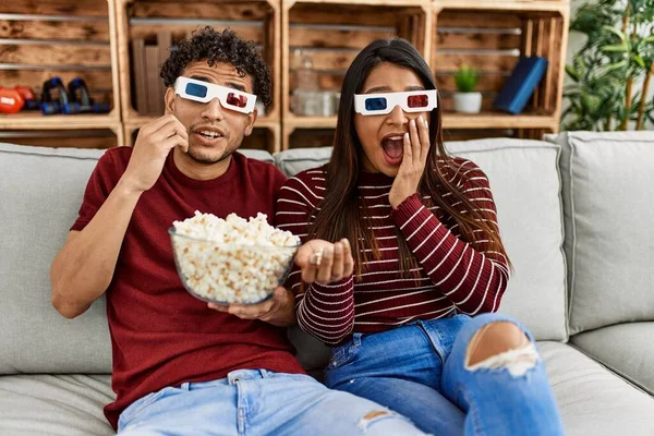 Young Latin Couple Scared Watching Movie Using Glasses Home — Stockfoto