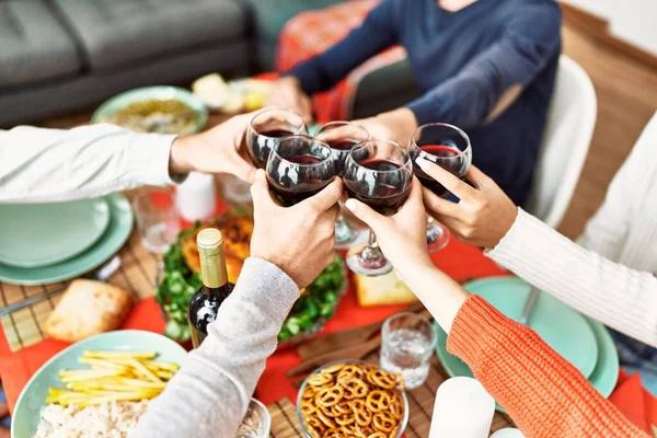 Group Young People Smiling Happy Celebrating Christmas Toasting Wine Home — Foto Stock