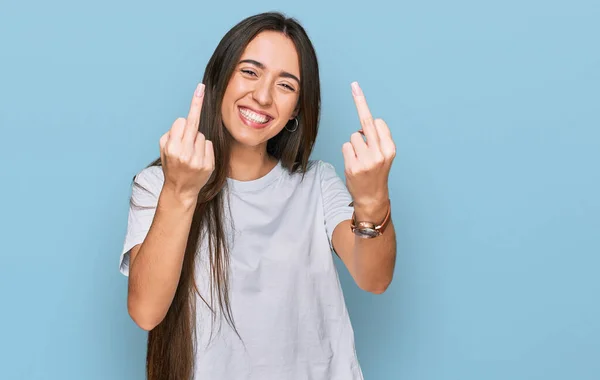 Young Hispanic Girl Wearing Casual White Shirt Showing Middle Finger — Φωτογραφία Αρχείου