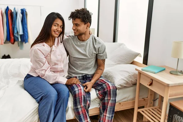 Young Latin Couple Smiling Happy Sitting Bed Bedroom — Stockfoto