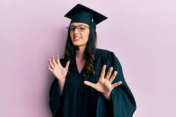 Young Hispanic Woman Wearing Graduation Cap Ceremony Robe Disgusted Expression — Stock Photo, Image