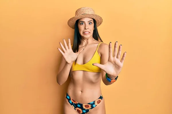 Young Hispanic Woman Wearing Bikini Summer Hat Afraid Terrified Fear — Stockfoto