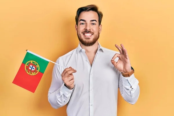 Handsome Caucasian Man Beard Holding Portugal Flag Doing Sign Fingers — стоковое фото