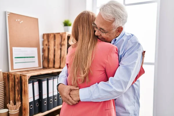 Middle Age Man Woman Business Workers Hugging Each Other Office — Stock Photo, Image