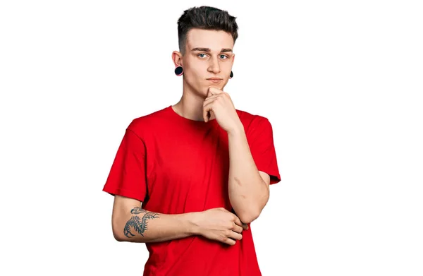 Young Caucasian Boy Ears Dilation Wearing Casual Red Shirt Thinking — 스톡 사진